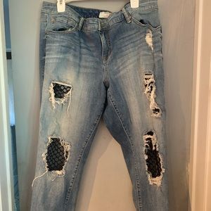 Torrid jeans with rip and netting details